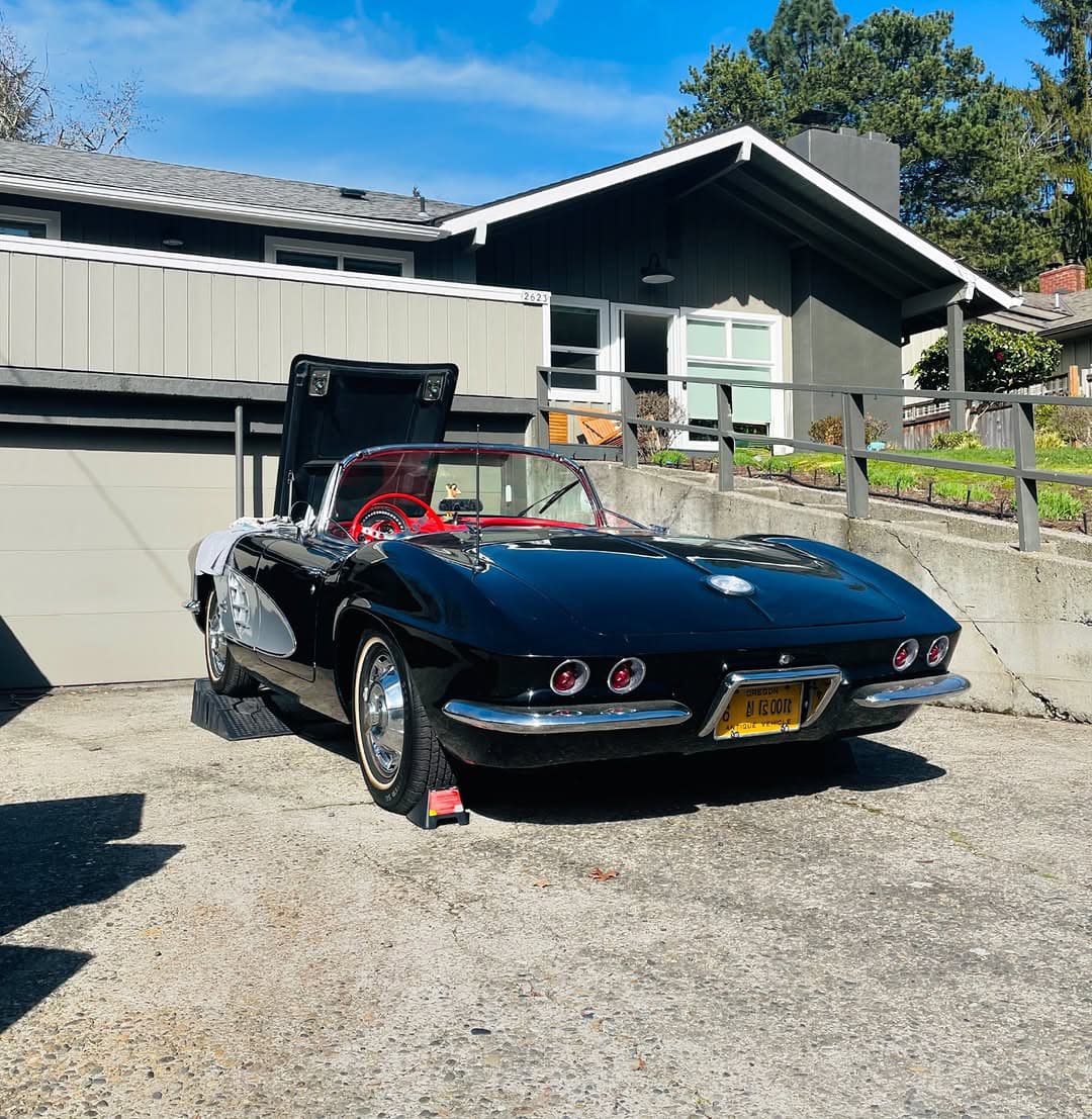 Oil Doctor servicing a classic Corvette in a Portland driveway